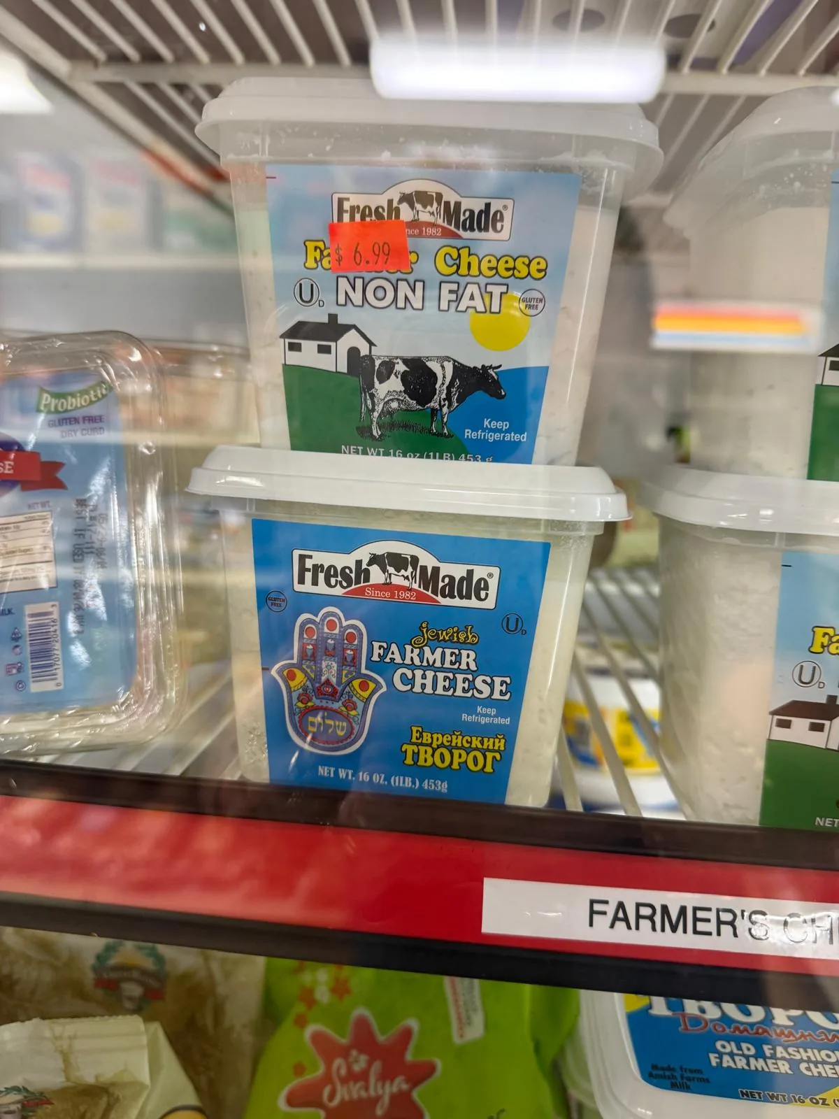 The dairy case with farmer's cheese, kefir, and European dairy