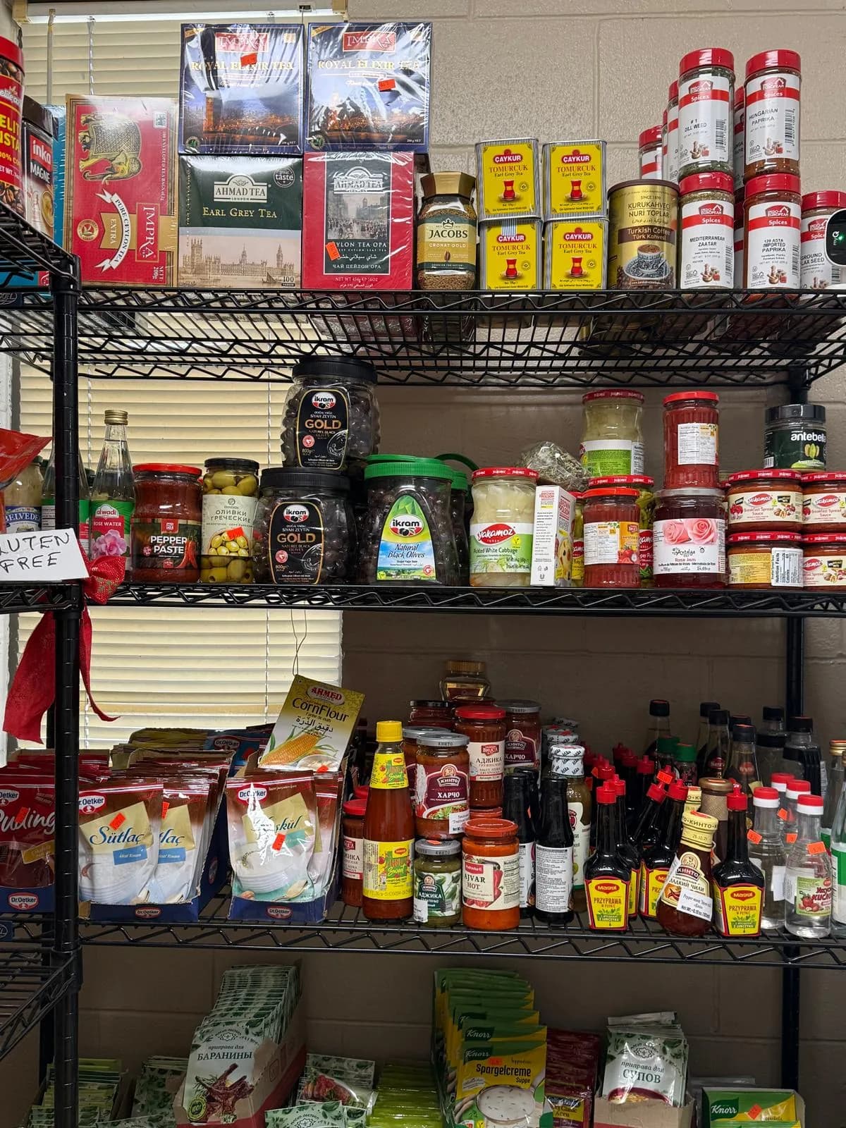 Shelves of imported teas and coffees
